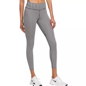 Black and white patterned, nike, size medium leggings.